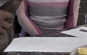 Sampling sausage at the breakfast table