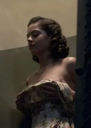 with confidence and pride she shows her breasts