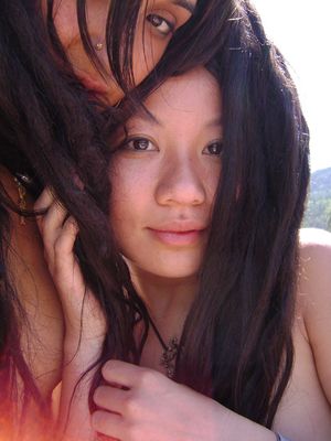 sweet faced asian hippie