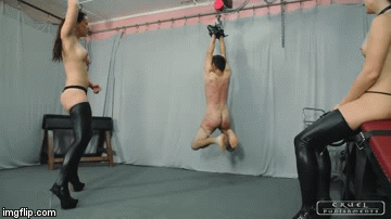 suspended slave is hard whipped by mistress