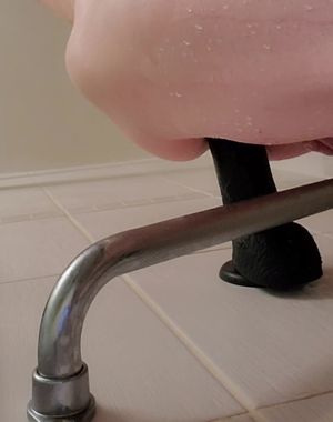 Sissy riding big black dildo