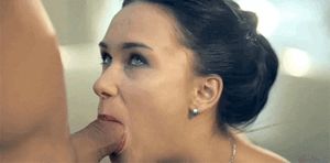 lady makes eye contact as she takes his cock in her soggy mouth