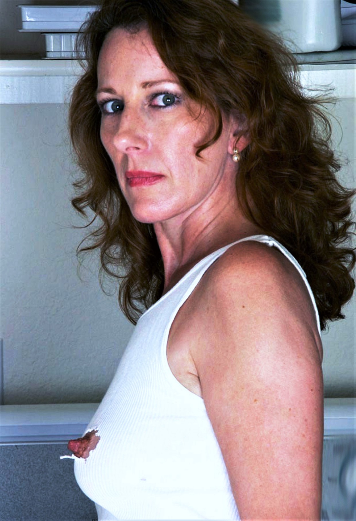 I cut these slits in my top for you son! I want you to suck them and then fuck me like I'm your bitch!