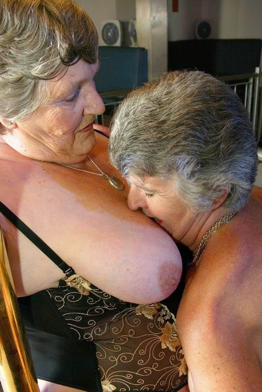 Two mature lesbian suck nipple