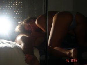 Amateur mirror-shot of a brunette sucking a dick