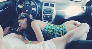 grab her by the ass as she sucks him like a pro