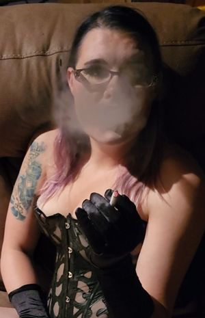 Emo milf blowing smoke