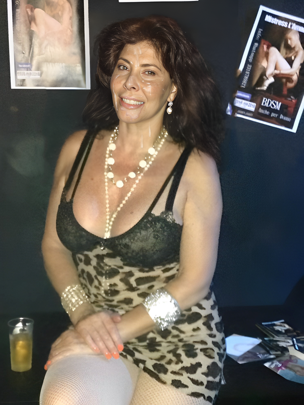 Great! Milly has one more picture taken after a blowjob scene in front of the camera with her face full of cum! What a hot woman!