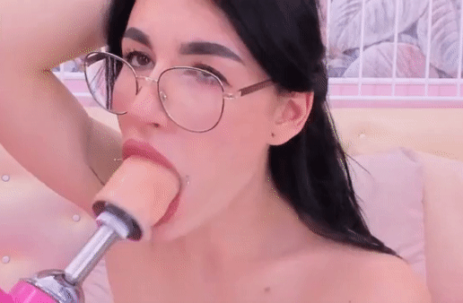 brunette getting face fucked by a machine