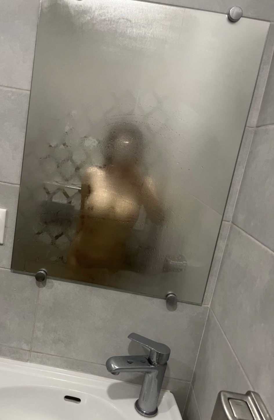 Selfie en espejo empañado