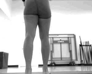 Sexy fit black babe bending over and spreading her legs stretching, nice ass