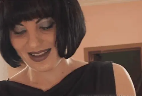 the mistress stuffs a huge strapon in her slave's ass