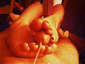Amateur footjob cumshot