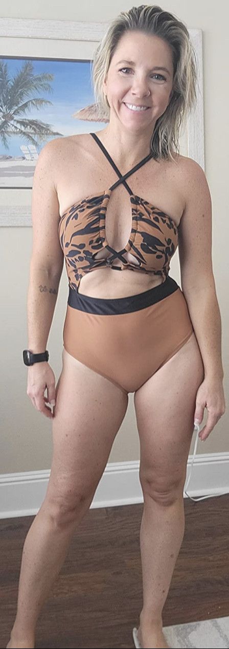 Sexy wife in her swimsuit