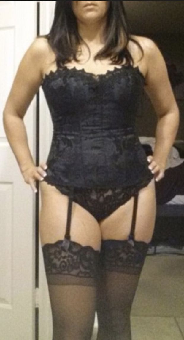 sexy brunette wife posing in black lingerie