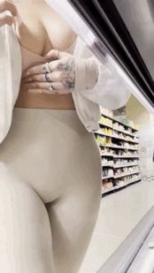 Blonde caught flashing her tits in the store