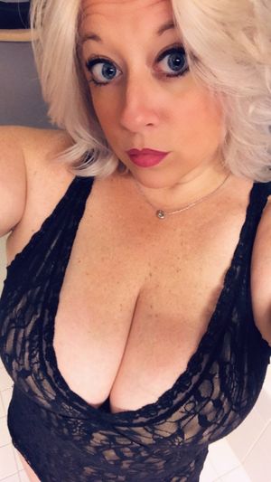 Blonde Milf with big blue eyes x