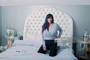 Beautiful big bed built for a tall woman.