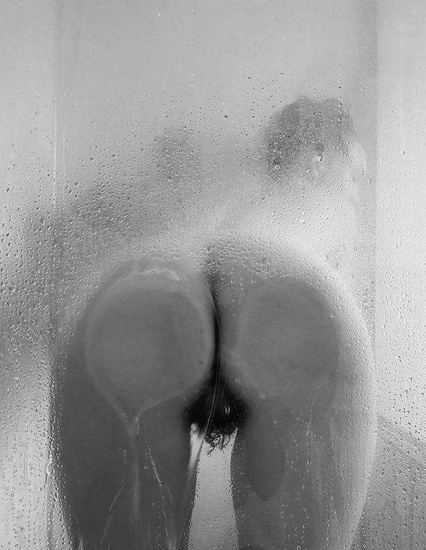 against the shower door