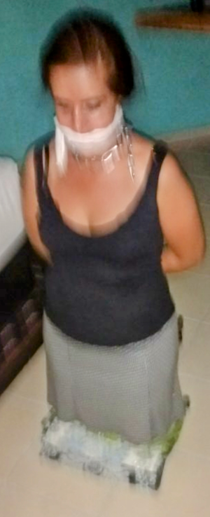 Broken Mexican submissive Anabell, collared sex slave posing as a furniture