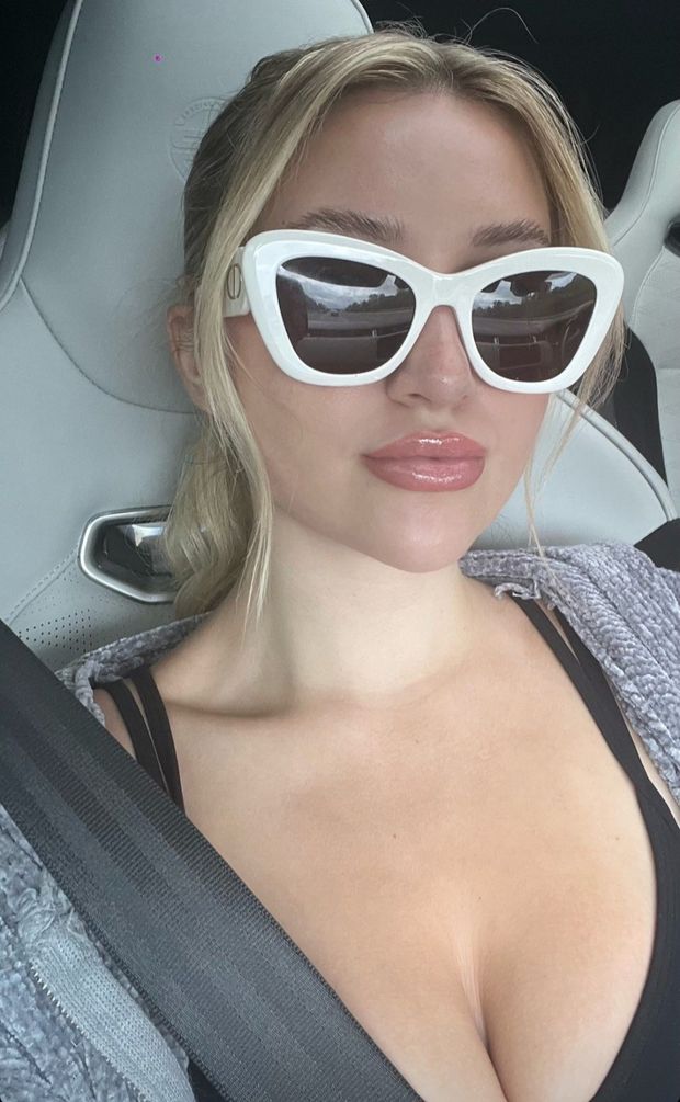 Claire car selfie white sunglasses