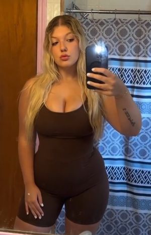 Destiny brown singlet bathroom selfie