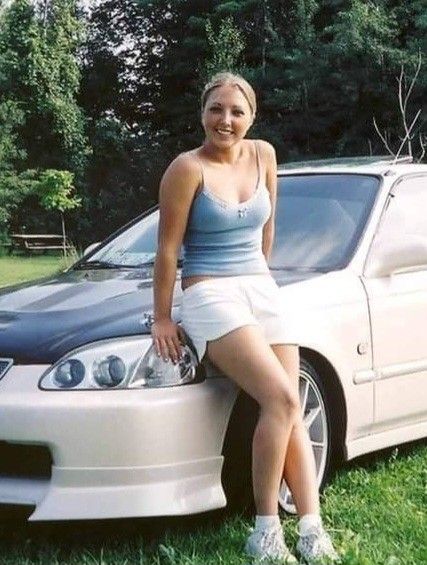 Pam against a car