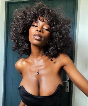 Princia Gonoporo showing off her Beautiful Cleavage
