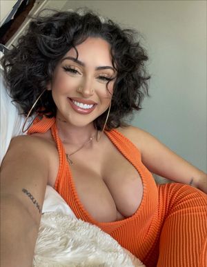 That smile makes me fall in love (her cleavage also helps)!!!