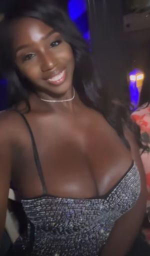 Ellie Mae black dress selfie