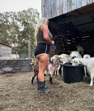 Juliana out on the farm feeding the live stock! In more ways than one!