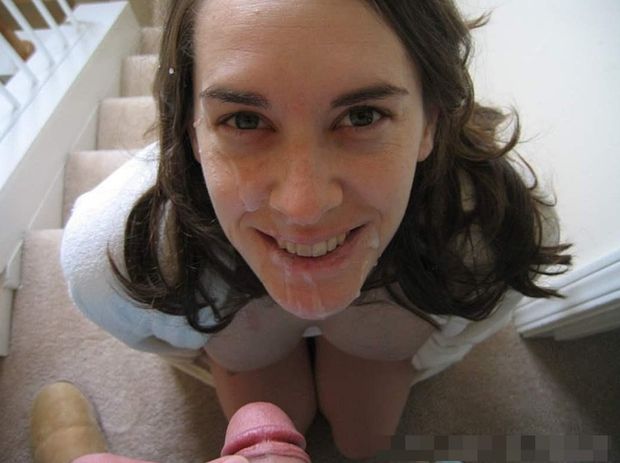 Happy amateur brunette on her knees with a facial