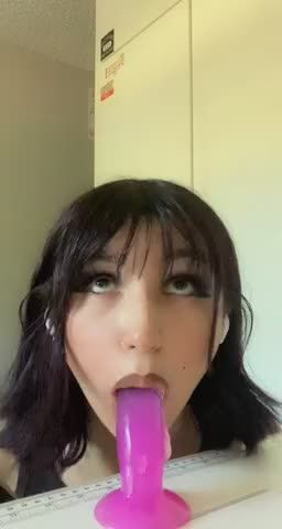 Emo slut sucking her toy
