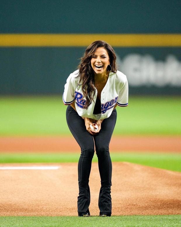 Throwing the first ceremonious pitch for the Rangers.
