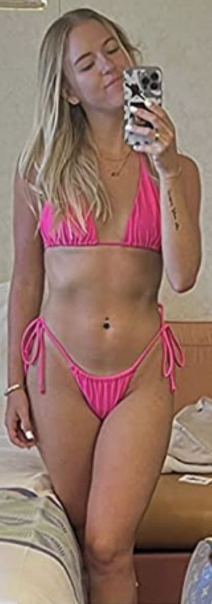 Sweet chick in a pink bikini selfie