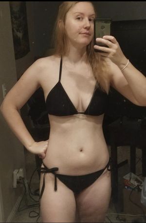 Regular chick in a black bikini