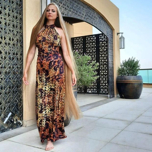 Long hair barefoot blonde.
