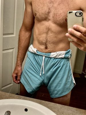 Sexy male with hot abs and a big dick in tight little shorts