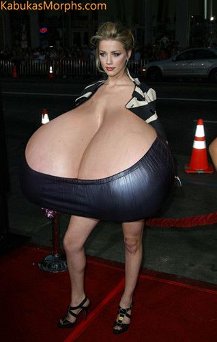 Amber Heard presenting her new giant silicone tits