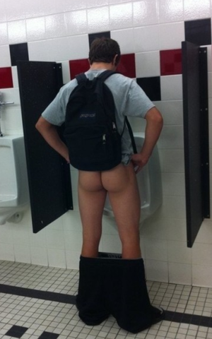 Dropping his drawers in the men's room