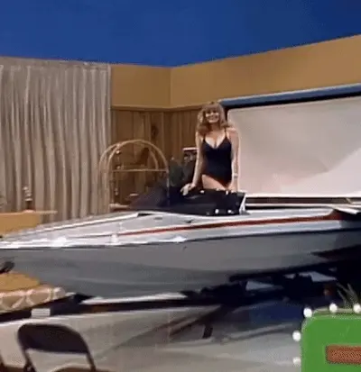 Babe on a boat in black.