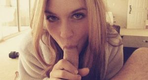 Sexy blond amateur sucking on a cock