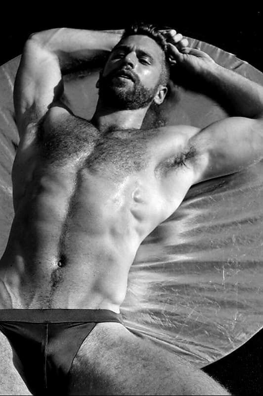 Hairy man in speedo