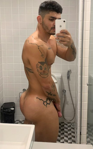Naked stud selfie in the men's room