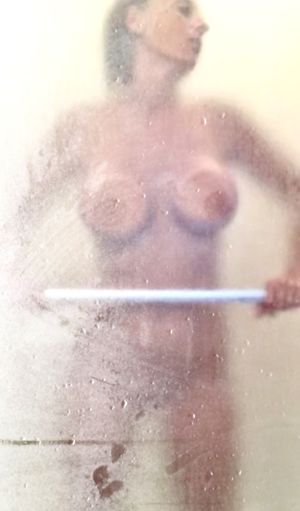 The wife taking a hot shower pic