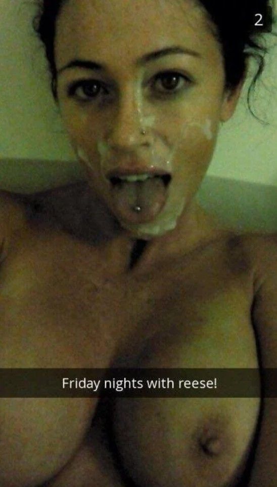 Hot brunette amateur taking a selfie with cum all over her face