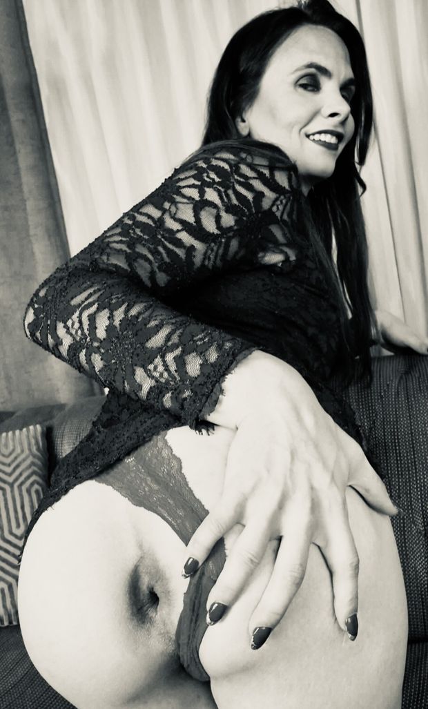 Brunette Tgirl open ass