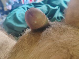 My semi-hard cock dripping precum