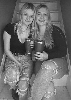 Keyra & friend sitting black & white