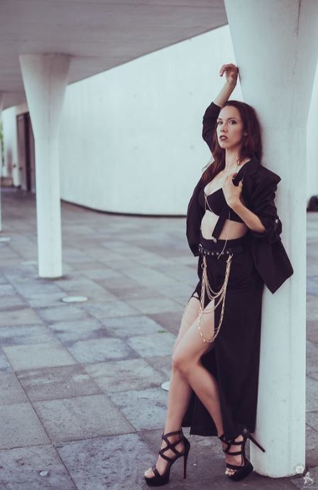 Black lingerie and platform heels on dark hair beauty